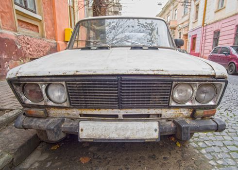 Old Lada car parked on a street  in Chernivtsi