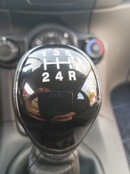 Manual shift car gear lever, car interior