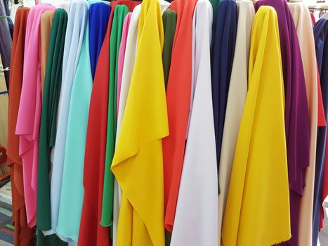 Colorful fabrics roll for tailors, textile market industry