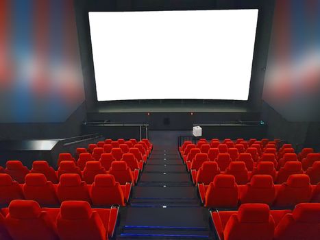 Empty red cinema auditorium, seats and screen