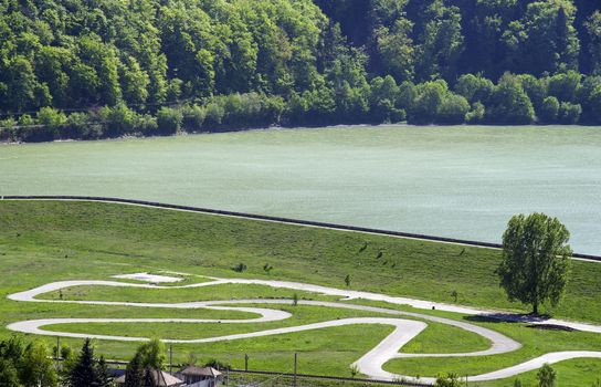 Karting race circuit near lake, aerial view