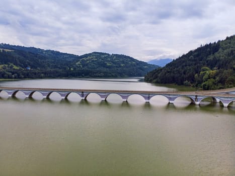 Panorama of a viaduct and river on a mountain valley, Bicaz Lake in Romania