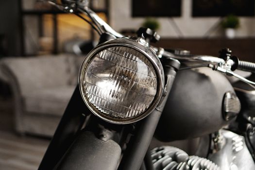 Motorcycle close-up in the room. Photo from the studio