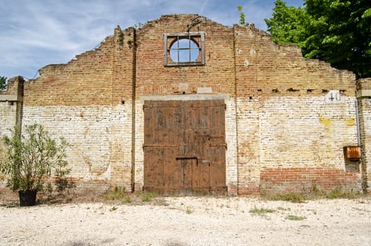 Facade of a disused building at the historic Forte Marghera in Venice, Italy.