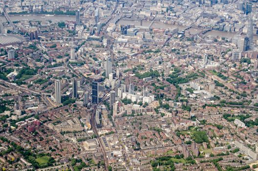 Aerial view of the London borough of Southwark with the new developments at Elephant and Castle prominent in the middle of the picture.  The River Thames flows across the top with the Blackfriars bridges in the middle.