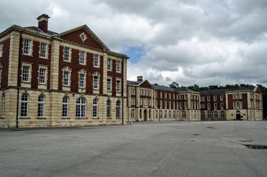 Wing of the Victorian New College buildings at the Royal Military Academy in Sandhurst where officers for the British Army are trained.