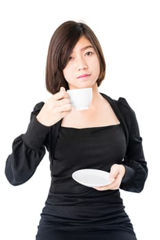 Young woman sittng holding coffee cup on white background