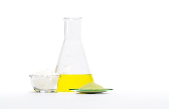 Cosmetic chemicals ingredient on laboratory table. Optiblanc MBT, Yellow cosmetic color (oil), Microcrystalline wax sp-623