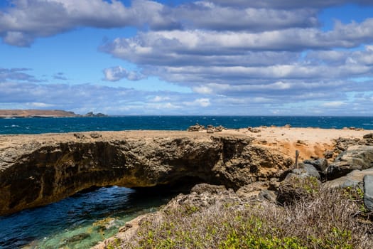 View of the natural bridge on the coast of Aruba