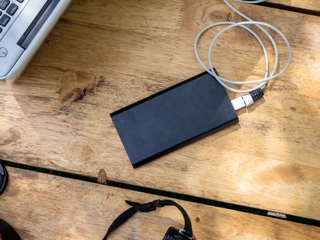 The Wooden portable external power bank, for emergency phone recharge