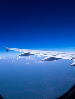 The looking at aircraft wing view from windows