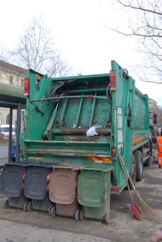 Bins with waste with food waste at the market