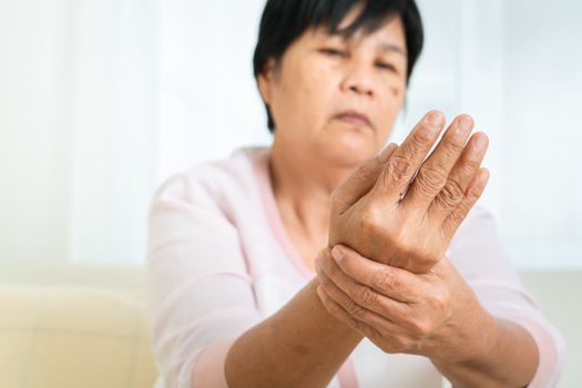 wrist hand pain of old woman, healthcare problem of senior concept