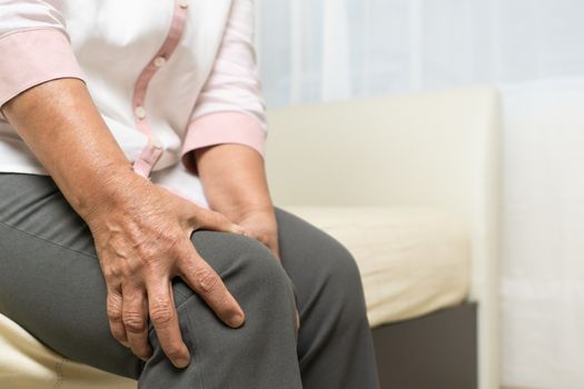 Knee pain of old woman at home, healthcare problem of senior concept