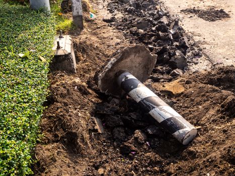 the Road repairing works with jackhammer. machine drills asphalt