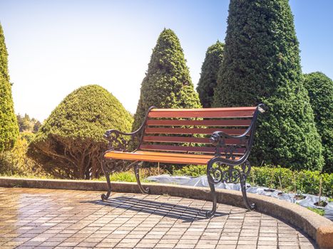 table and chairs standing on a lawn at the garden