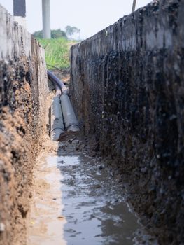 installing concrete drains on the side of the road