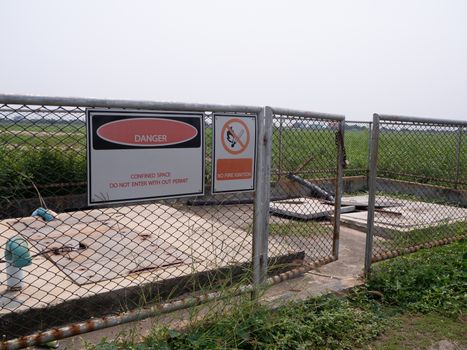 Restricted Area Sign on wire mesh fence