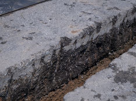 installing concrete drains on the side of the road