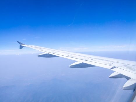 The looking at aircraft wing view from windows