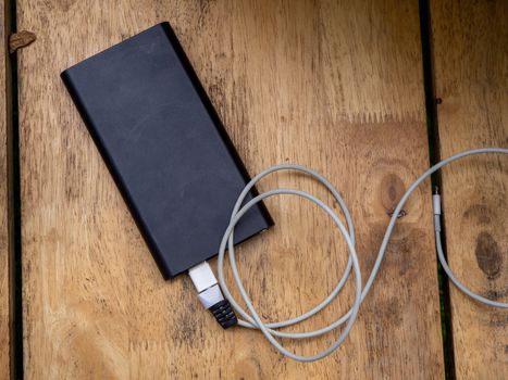 The Wooden portable external power bank, for emergency phone recharge