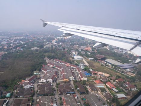 The looking at aircraft wing view from windows