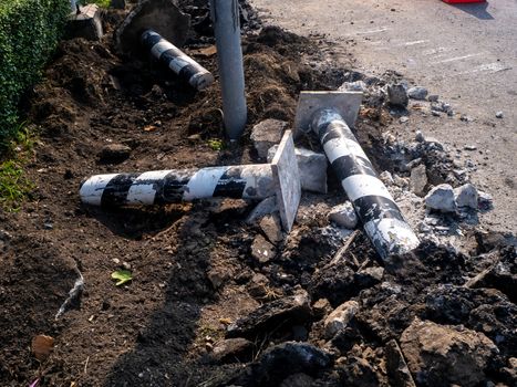 the Road repairing works with jackhammer. machine drills asphalt