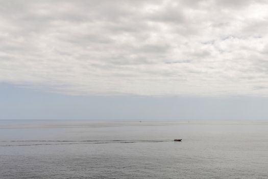 Motorboat crossing the Atlantic Ocean on the island of Madeira, Portugal