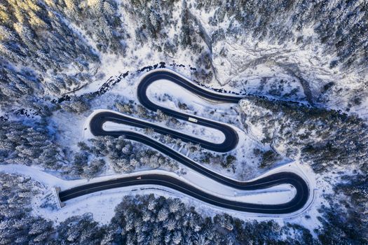 Winding road in rocky mountain and tunnel entrance. Bicaz gorge is a narrow pass between two historical Romanian region.