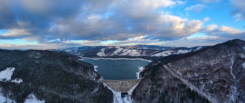 Aerial view of energy dam, winter landscape at Bicaz Dam in Romania