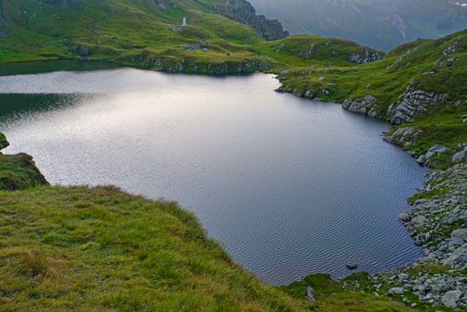 Summer lake scene, Capra Lake in Fagaras Mountains