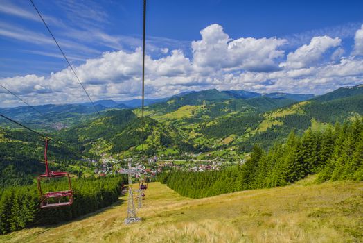 Chairlift system in summer mountain landscape. Borsa is a well known winter sports resort in Romania