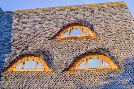Roof window in a traditional  romanianwooden house from Maramures, northern Romania