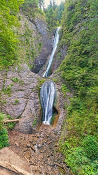 Beautifull mountain stream waterfall in Romanian Carpathians, summer view of Duruitoarea.