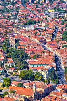Aerial view of Brasov city in Romania, street and ancient buildings