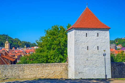 Defense stone wall and tower of ancient citadel Brasov, Romania