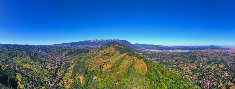 Bran is an important touristic destination in Romania, autumn mountain landscape panorama from above