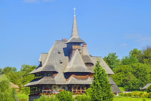 Barsana monastery house in the middle of nature. Barsana monastery is an important landmark in Maramures area (Romania)