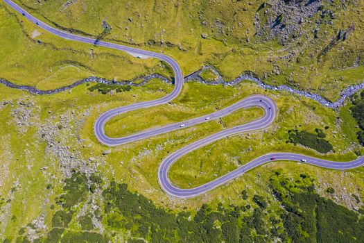Winding mountain road, Transfagarasan in Romanian Carpathians, above view of summer scene