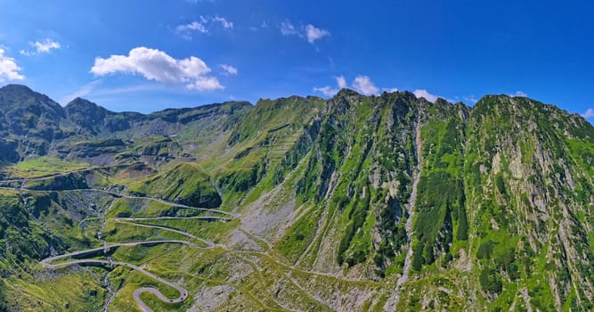 Aerial view of winding road in Romanian Carpathians, summer view of Transfagarasan road in Romania