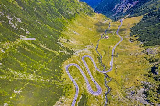 Above view of curvy road in Romanian Carpathians, summer view, Transfagarasan road in Romania