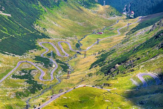 Aerial view of curvy road in mountains, Transfagarasan summer road in Romania