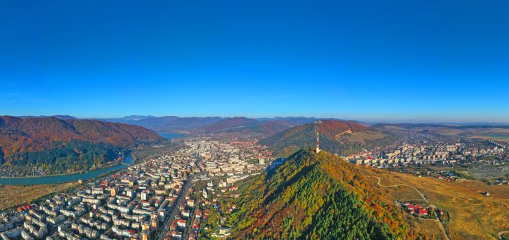 Mountain city in autumn, Piatra Neamt downtown panorama in Romania