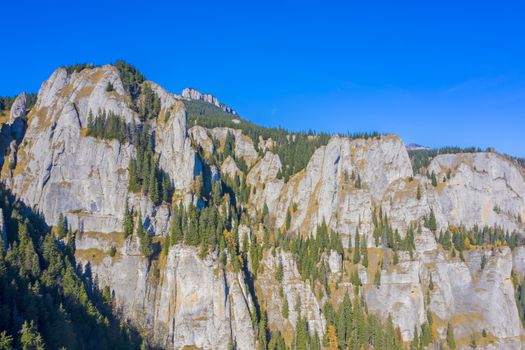 Autumn rocky mountain landscape in Romanian Carpathians, rock wall