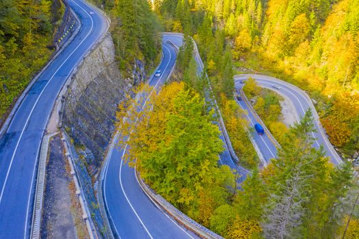 Serpentine mountain road in autumn. Bicaz Gorges are a mountain pass between two historic regions in Romania.