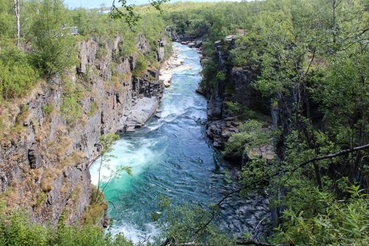 Overview of Kungsleden river in the arctic tundra. Abisko national park, Nothern Sweden