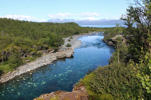 Overview of Kungsleden river in the arctic tundra. Abisko national park, Nothern Sweden