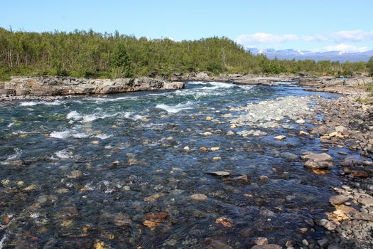 Overview of Kungsleden river in the arctic tundra. Abisko national park, Nothern Sweden