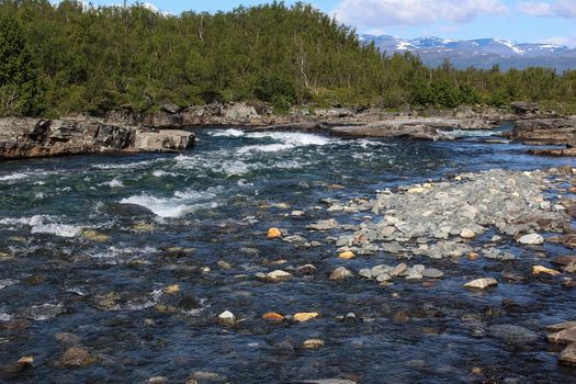 Overview of Kungsleden river in the arctic tundra. Abisko national park, Nothern Sweden