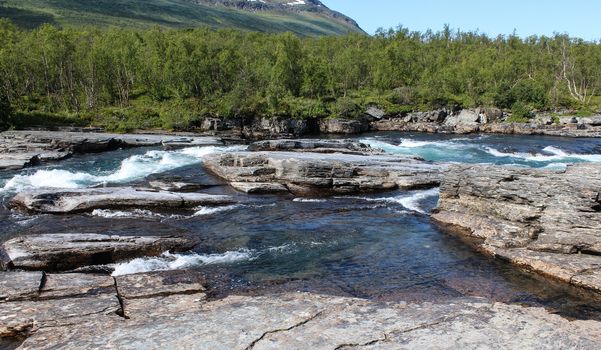 Overview of Kungsleden river in the arctic tundra. Abisko national park, Nothern Sweden